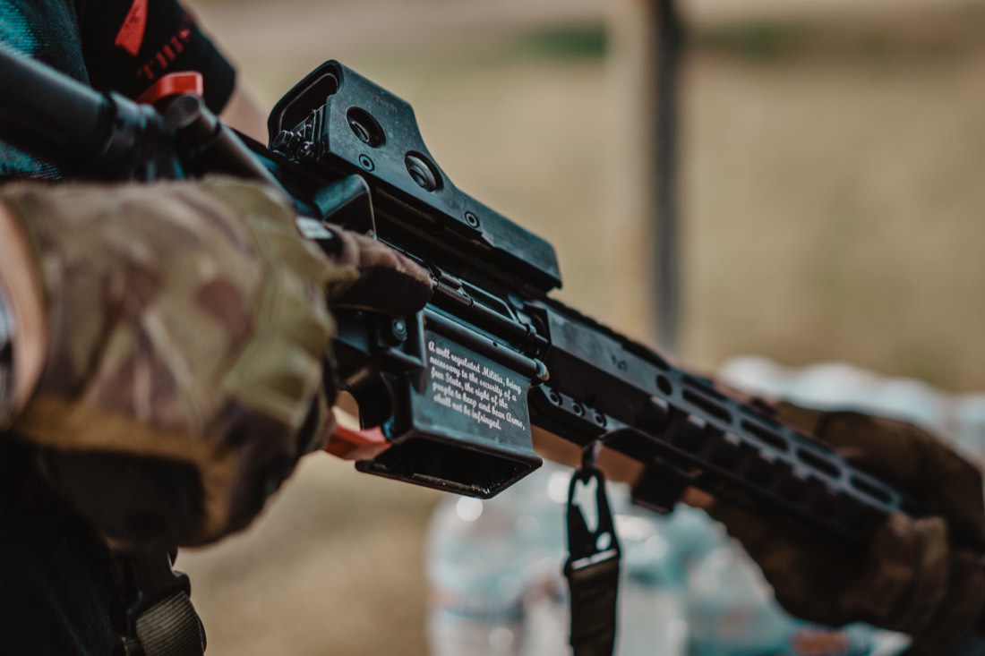 Close-up of a rifle optic at the range